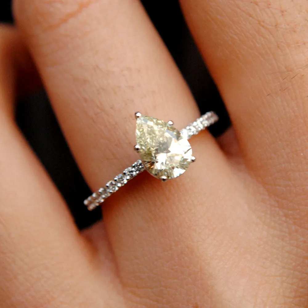 1 Carat Pear Diamond Engagement Ring with Marquise Diamond Curved Stack Wedding Band