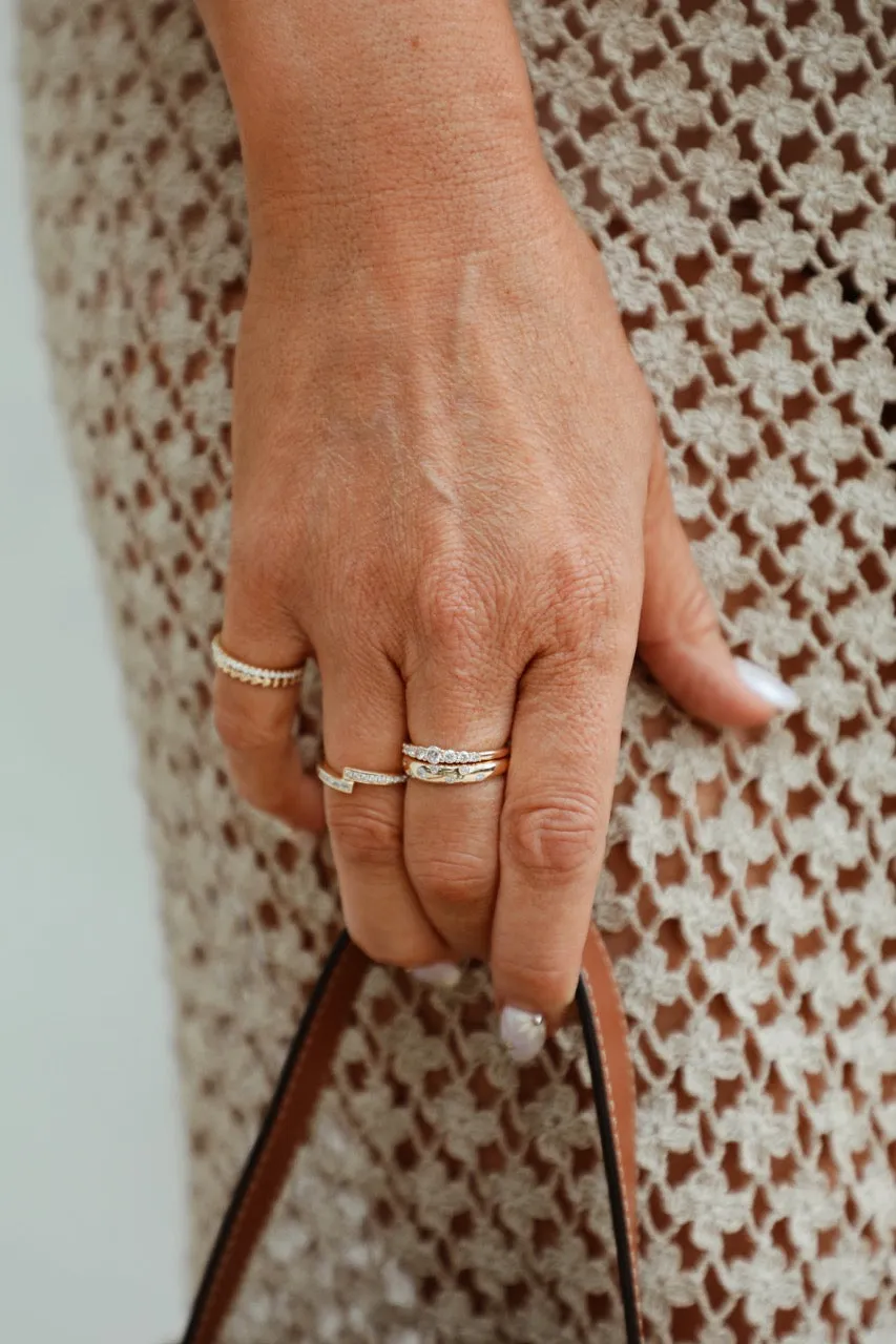 Baguette & Round Diamond Crossover Ring