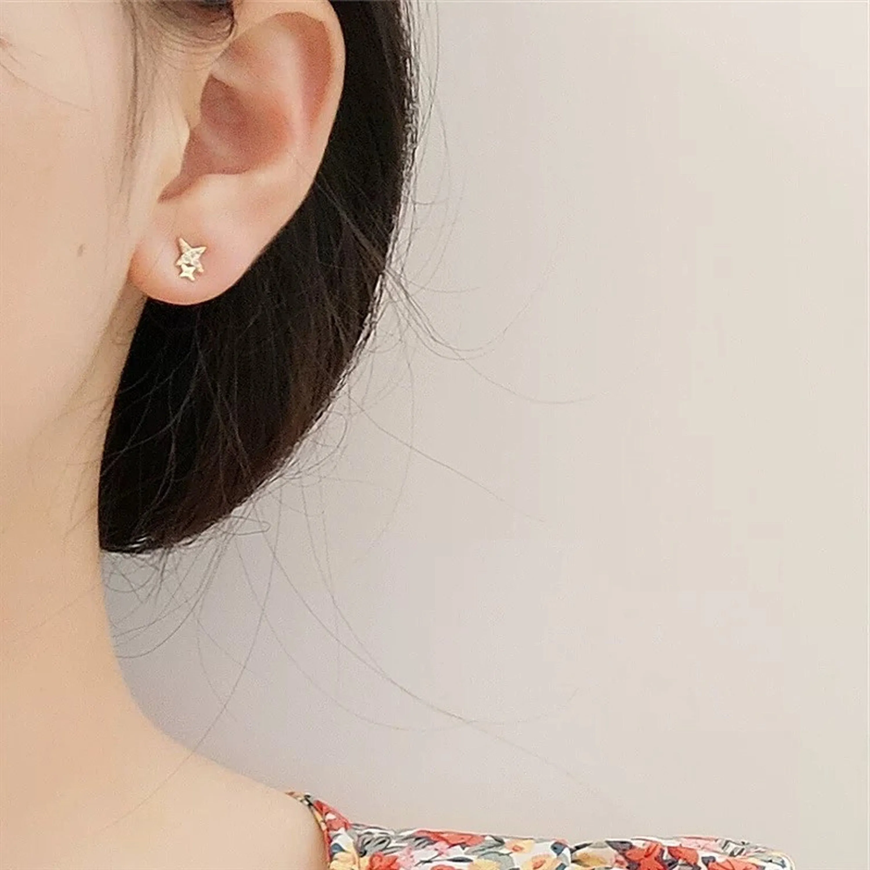 Gold north star cuff earrings