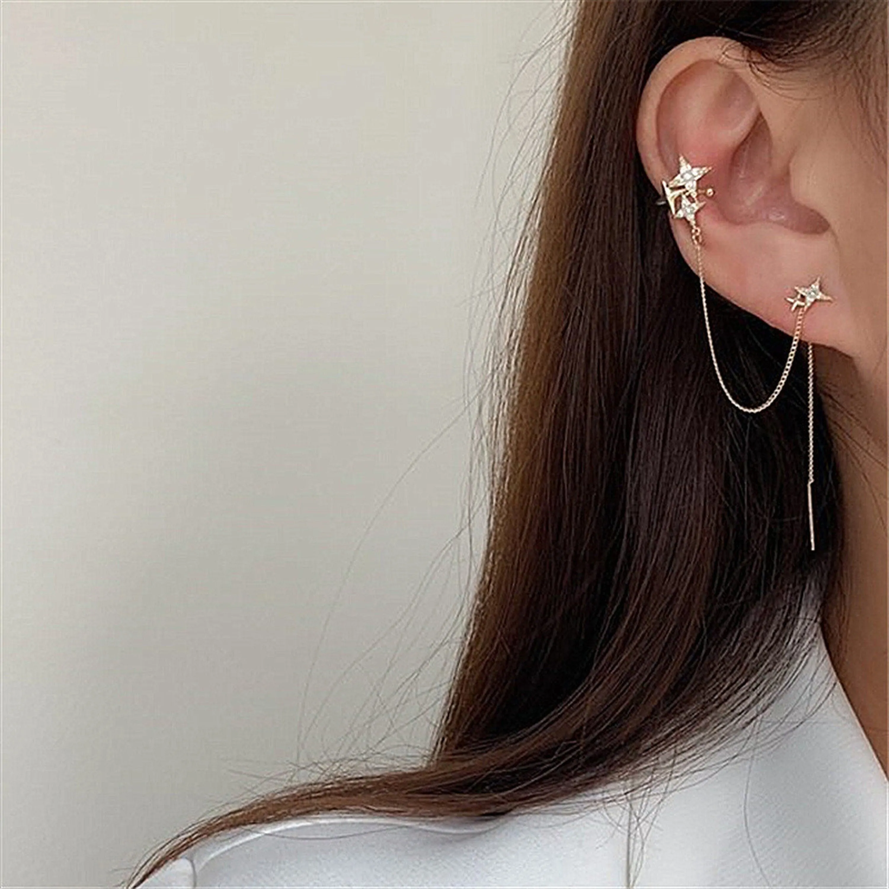 Gold north star cuff earrings