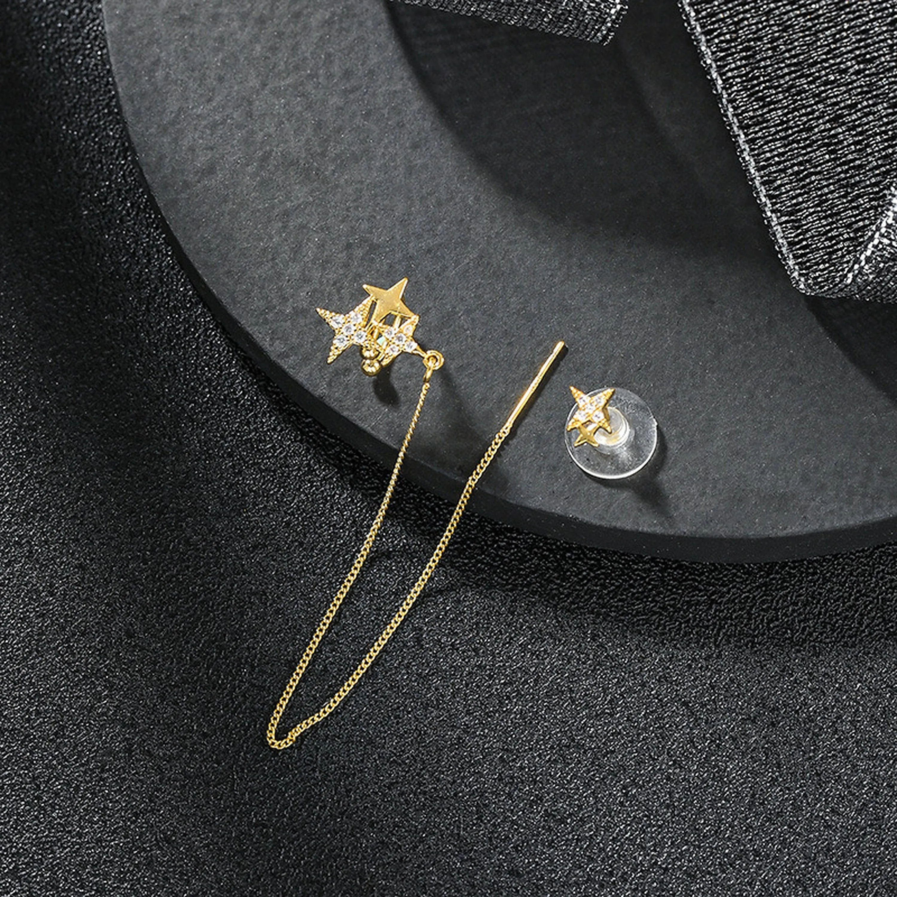 Gold north star cuff earrings