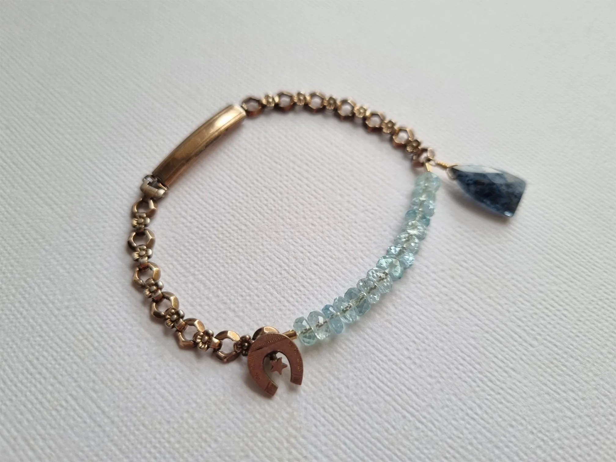 lucky charm bracelet | vintage watch band bracelet with aquamarine kyanite and antique horseshoe charm