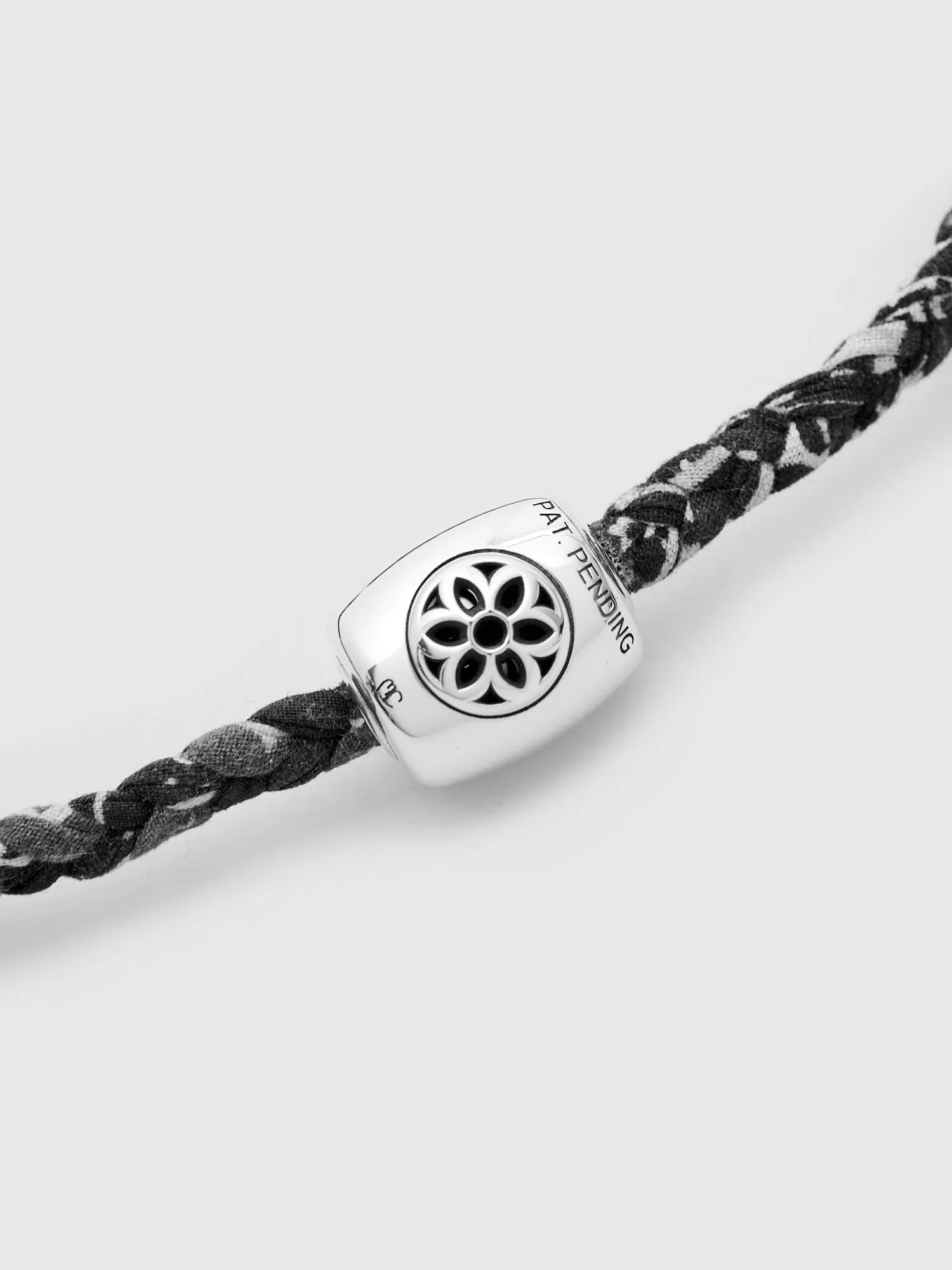 Raised Rosette Pooka Necklace in Sterling Silver
