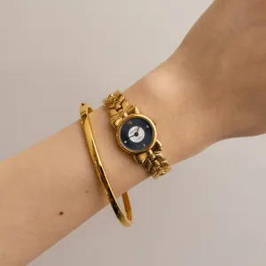 Vintage Nina Ricci Swiss Midnight Bow Gold Watch